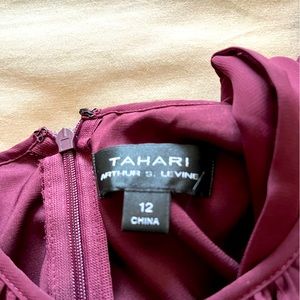 Wine colored mid length -same color belt - sample so no tags - never worn .